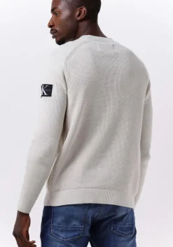 beige calvin klein sweater monologo badge sweater