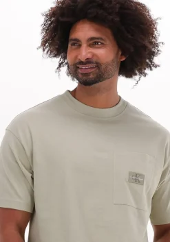 beige calvin klein t-shirt shrunken badge pocket tee