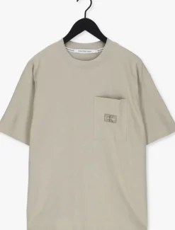 beige calvin klein t-shirt shrunken badge pocket tee