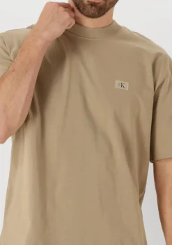 beige calvin klein t-shirt woven label relaxed tee