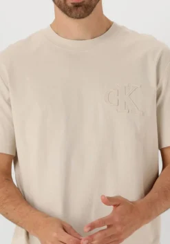 beige calvin klein t-shirt ck applique tee