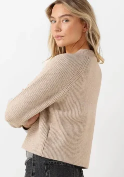 beige co'couture trui the row officer rib knit