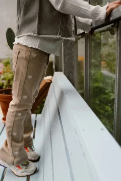 beige daily7 flared broek 2400 flared fit