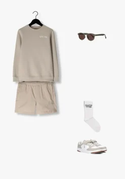 beige malelions sweater paint sweater