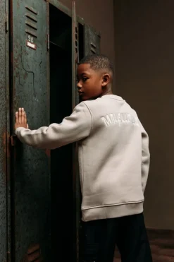 beige malelions sweater paint sweater