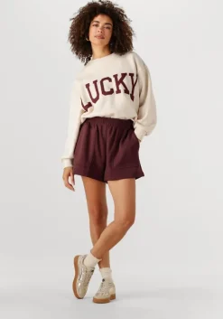 beige maruti lage sneakers yale