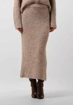 beige moves midirok bistina