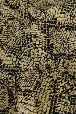 beige nik & nik broeken snake skort