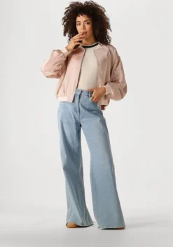 beige nukus top nice singlet