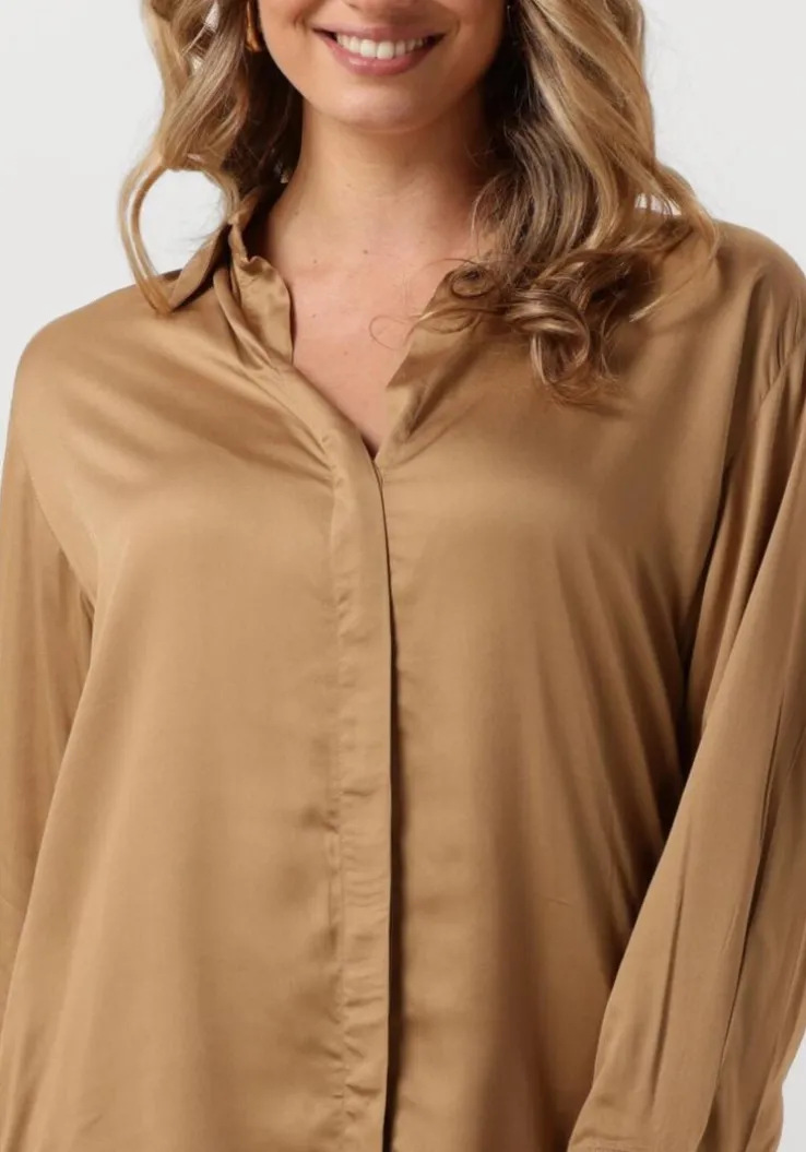 beige omoda atelier blouses x kae