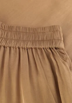 beige omoda atelier wijde broek x kae