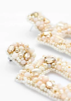 beige paulie pocket oorbellen classic shimmer earrings