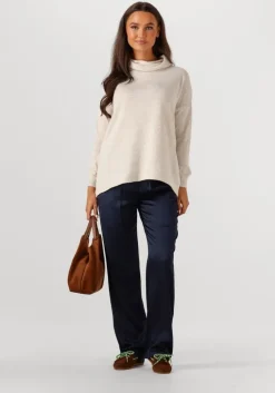 beige resort finest coltrui large turtle neck