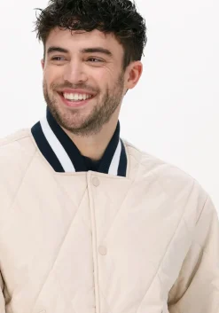 beige tommy jeans jack tjm diamond quilted bomber