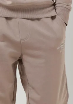 beige tommy jeans joggingbroek tjm reg signature sweatpants