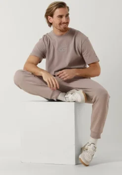 beige tommy jeans joggingbroek tjm reg signature sweatpants