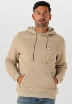 beige tommy jeans sweater tjm reg badge hoodie ext