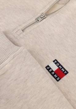 beige tommy jeans trui tjw bxy crp badge 1/4zip
