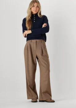 blauwe tommy hilfiger trui gold button polo ls sweater