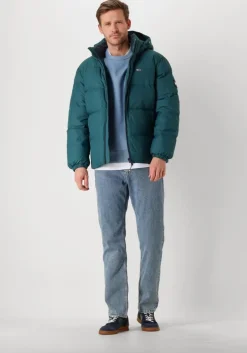 blauwe tommy jeans sweater tjm reg badge crew ext