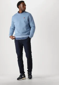 blauwe tommy jeans sweater tjm reg badge crew ext