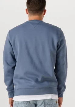 blauwe tommy jeans sweater tjm reg s flag crew ext