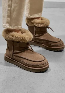 bruine ugg vachtlaarzen classic mini alpine