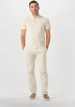 creme dstrezzed polo dorian zip polo
