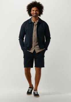 donkerblauwe pure path overshirt punta coack shirt with press buttons and front print