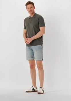 donkergroene dstrezzed polo dorian zip polo