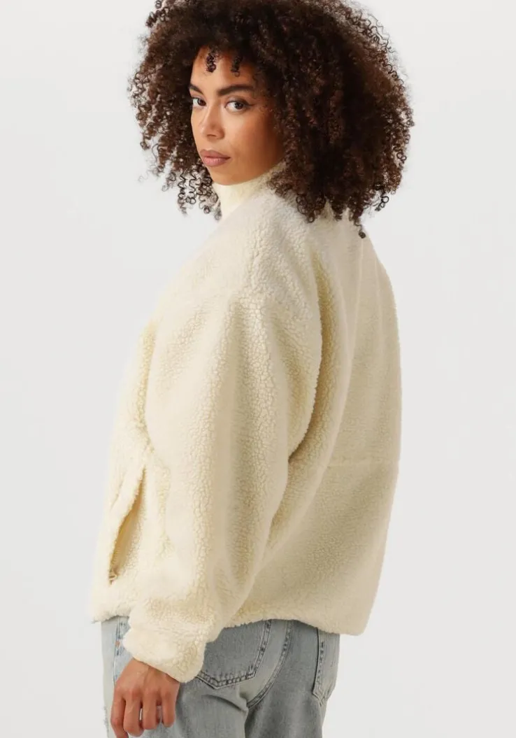 ecru american vintage faux fur jas hoktown woman