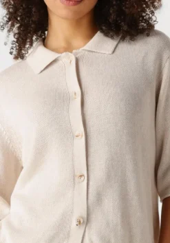 ecru knit-ted vest yoshi