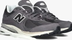 grijze new balance lage sneakers m2002 m