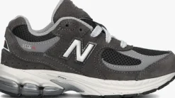 grijze new balance lage sneakers pc2002