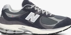 grijze new balance lage sneakers m2002r m