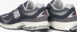 grijze new balance lage sneakers m2002r m