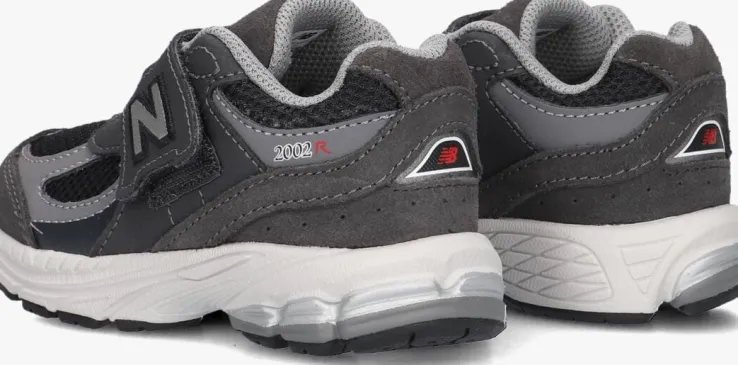 grijze new balance lage sneakers iv2002