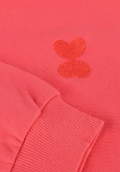 koraal petit blush sweater june ruffle sweater