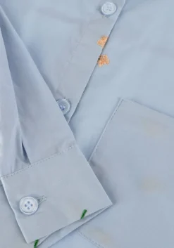 lichtblauwe retour blouses patty