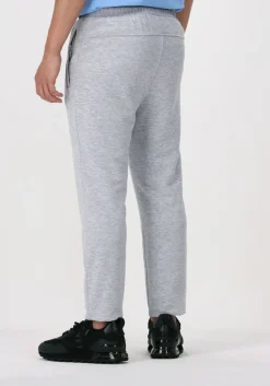 lichtgrijze cruyff joggingbroek aimar pant - 280 gsm brushback woven overlayers
