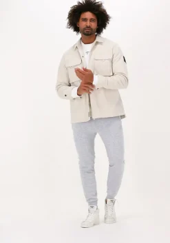 lichtgrijze cruyff joggingbroek aimar pant - 280 gsm brushback woven overlayers