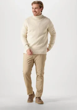 witte dstrezzed coltrui ove turtleneck