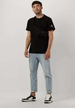 zwarte calvin klein schoudertas ck must waistbag