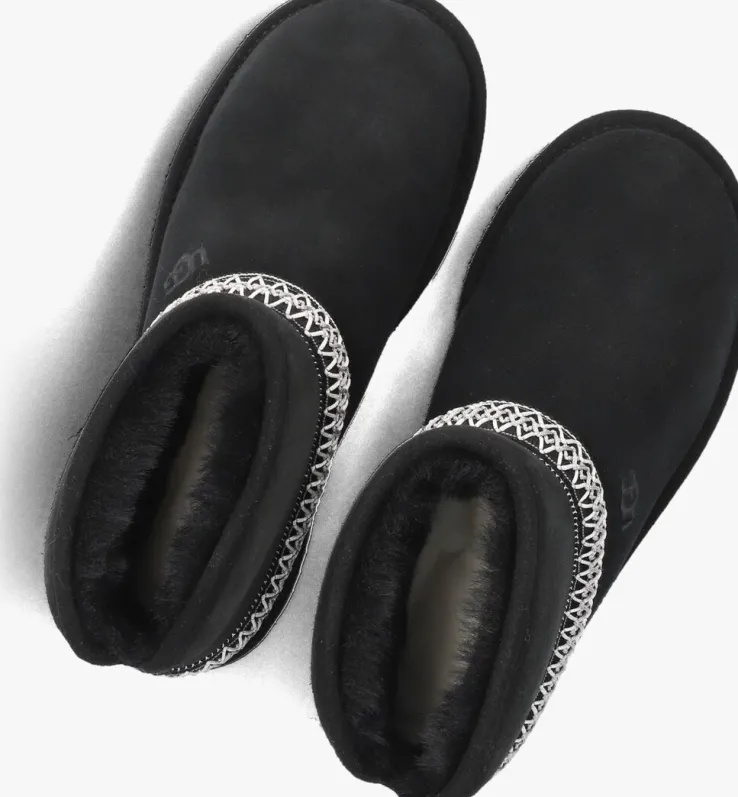 zwarte ugg vachtlaarzen classic mini crescent